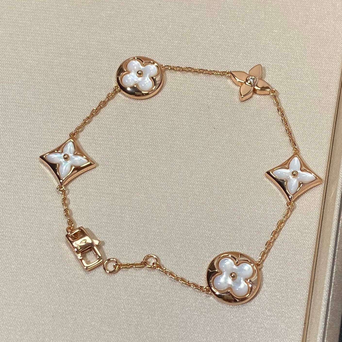 [Topon Jewelry]STAR AND SUN 5 MOTIF MOP PINK GOLD BRACELET