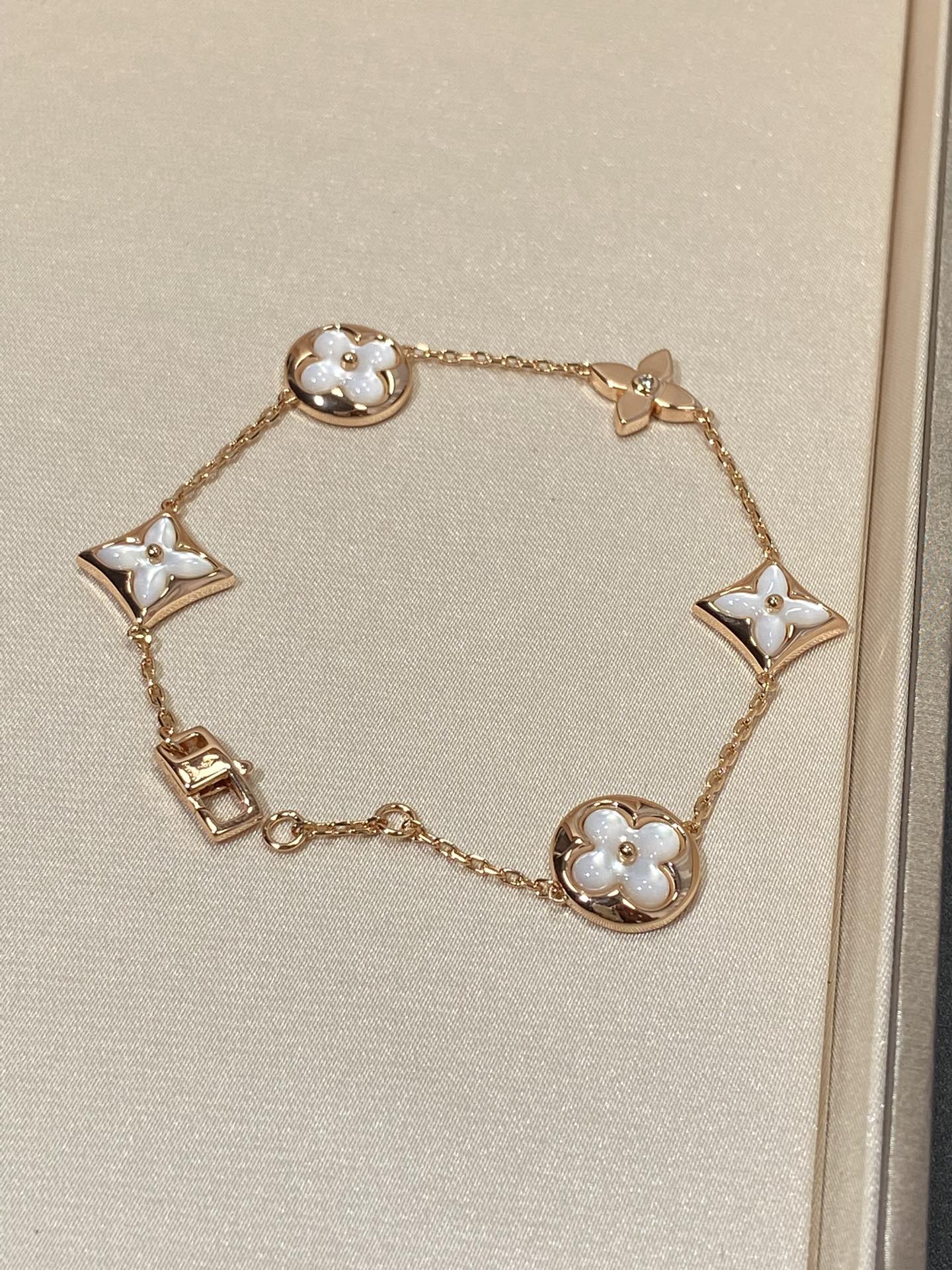 [Topon Jewelry]STAR AND SUN 5 MOTIF MOP PINK GOLD BRACELET